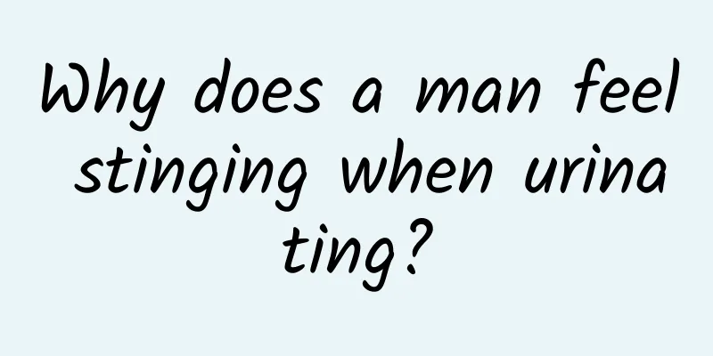 Why does a man feel stinging when urinating?