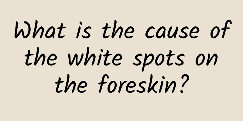 What is the cause of the white spots on the foreskin?