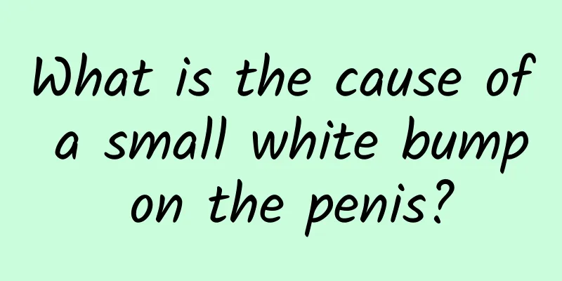 What is the cause of a small white bump on the penis?