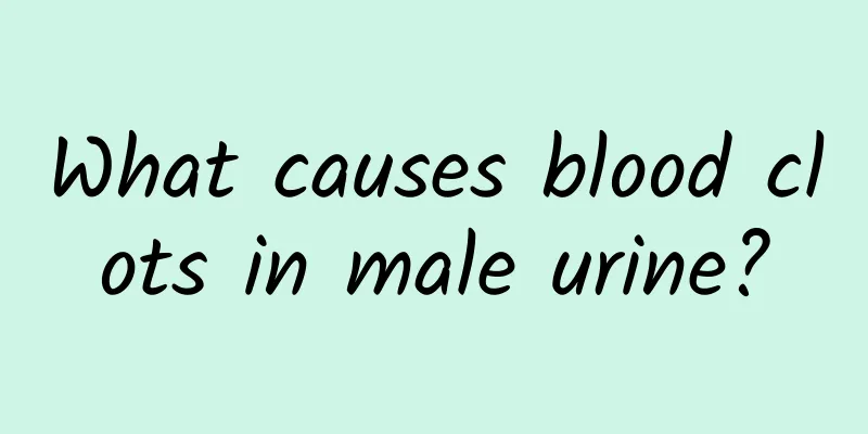 What causes blood clots in male urine?