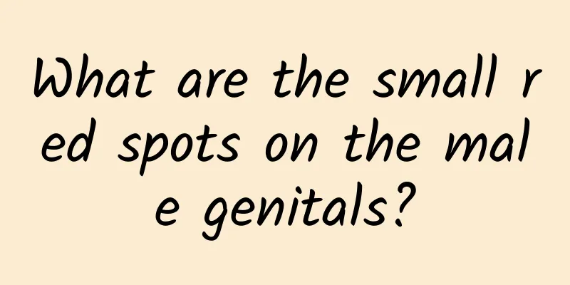 What are the small red spots on the male genitals?