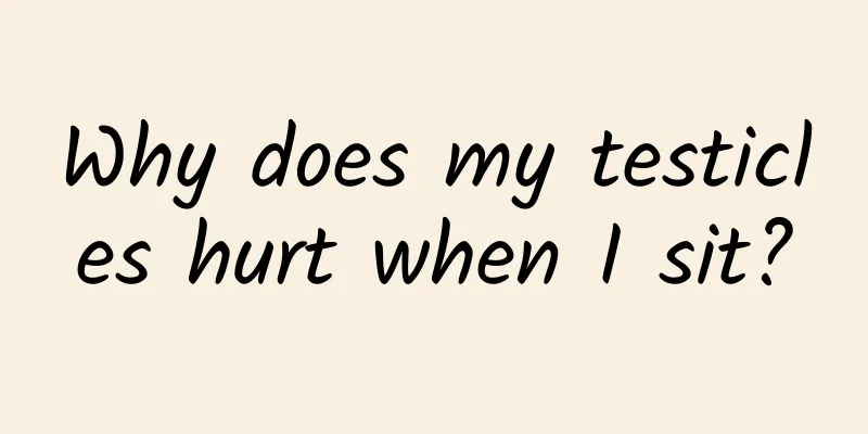 Why does my testicles hurt when I sit?
