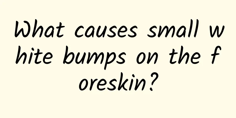 What causes small white bumps on the foreskin?