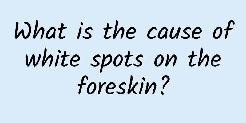 What is the cause of white spots on the foreskin?