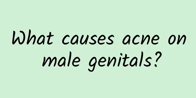 What causes acne on male genitals?
