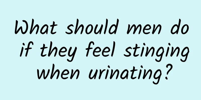 What should men do if they feel stinging when urinating?