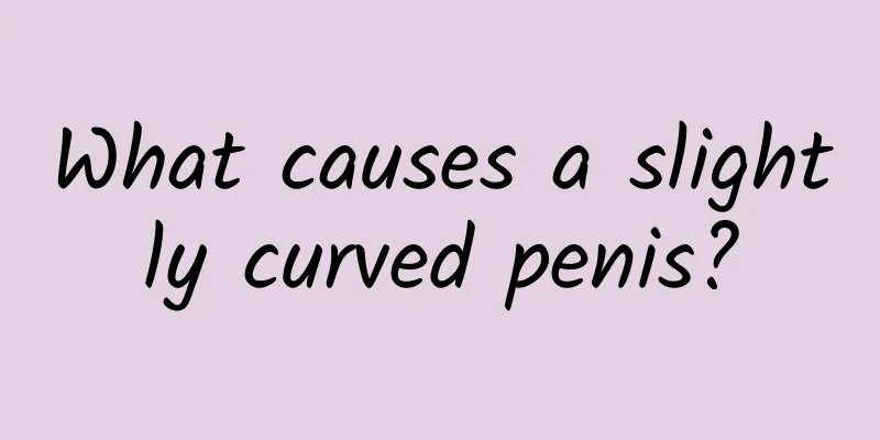 What causes a slightly curved penis?